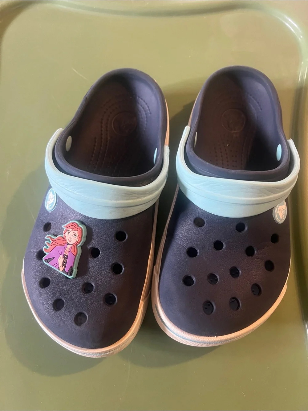 CROCS kids clogs in navy with light blue strap and pink charm